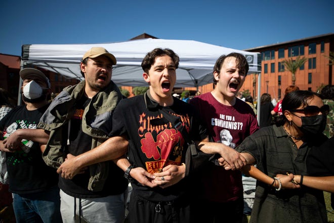 Pro-Palestinian protesters gather on the lawn in front of Arizona State University's historic Old Main building in Tempe on April 26, 2024. Protesters set up encampments at approximately 8:45 a.m. and were met with police presence shortly after.